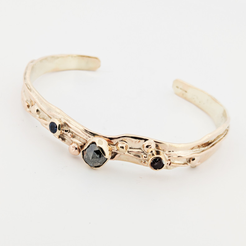 Set with salt n pepper diamonds and garnet Set with salt n pepper diamonds and garnet