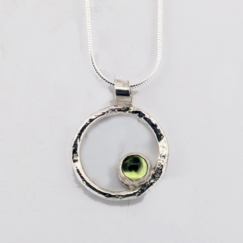 Silver set with Peridot.